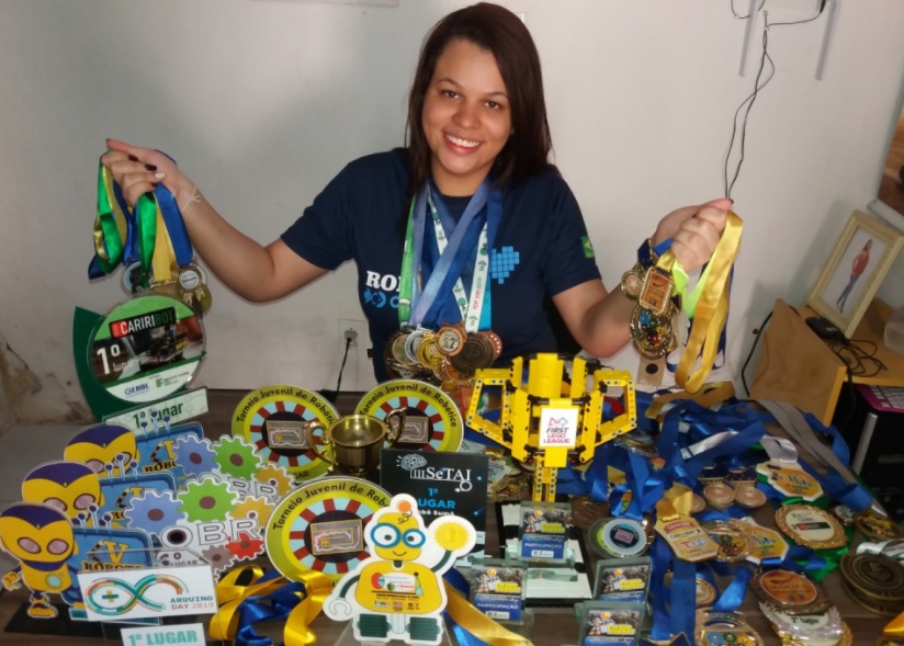 Estudante e suas medalhas